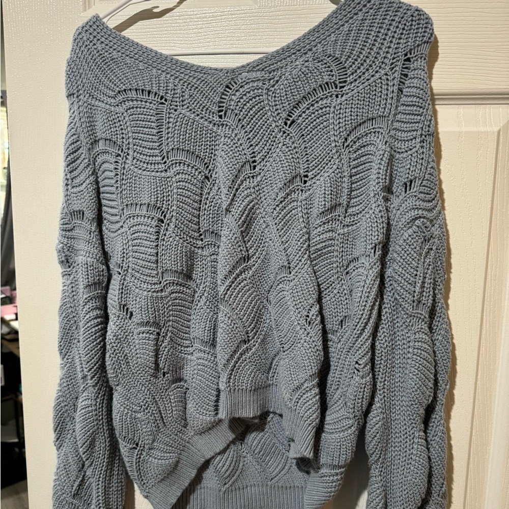 Off the shoulder sweater.